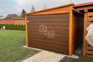 Garaż blaszany 3x4,5m Brama uchylna drewnopodobny rynny dach TKD324