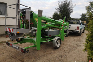 Podnośnik koszowy na przyczepie zwyżka wynajem podest ruchomy